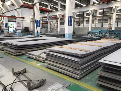 What is S235J2W steel material?
